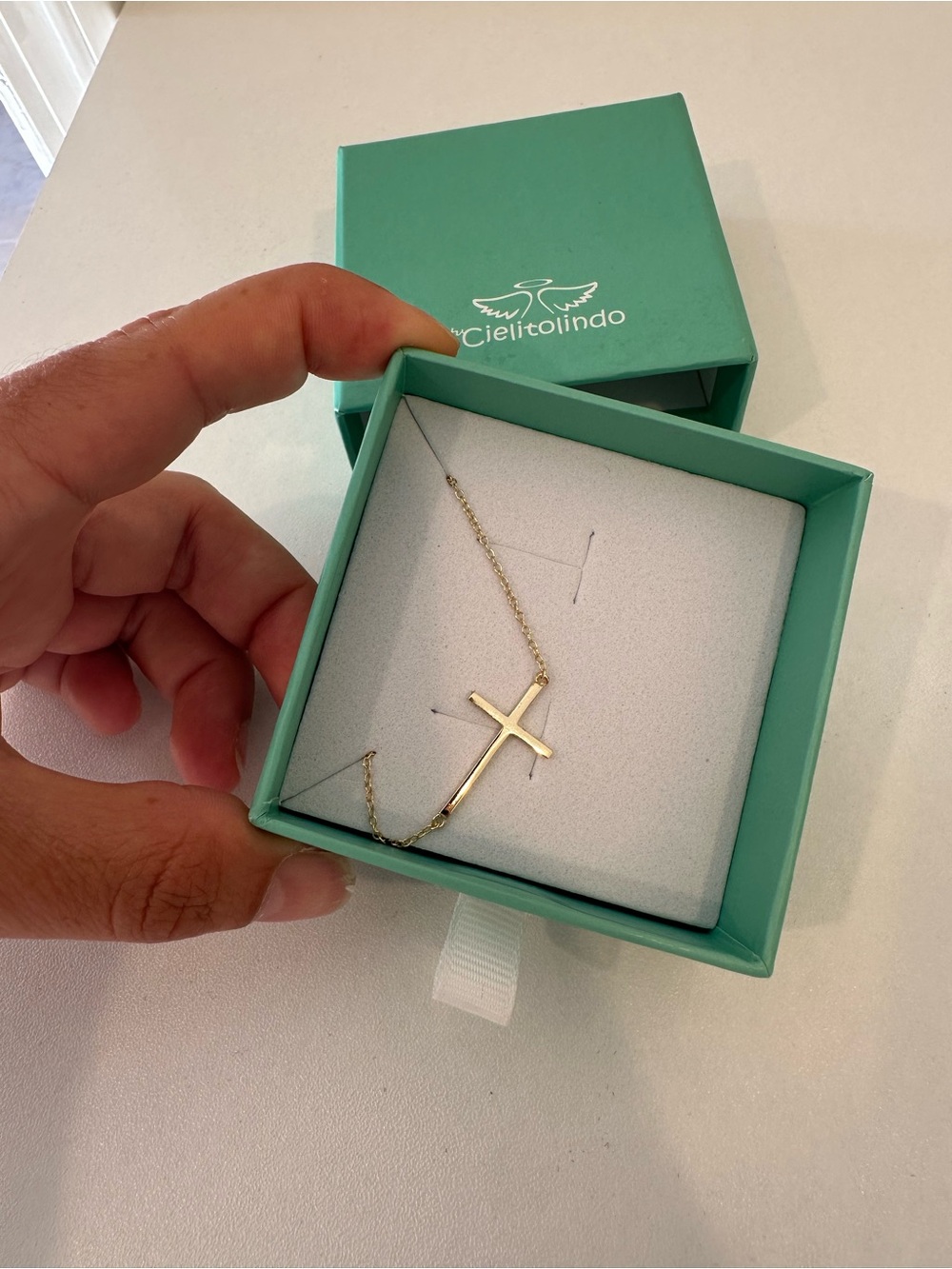 Cielito Lindo Gold Sideways Cross Necklace with Teal Box